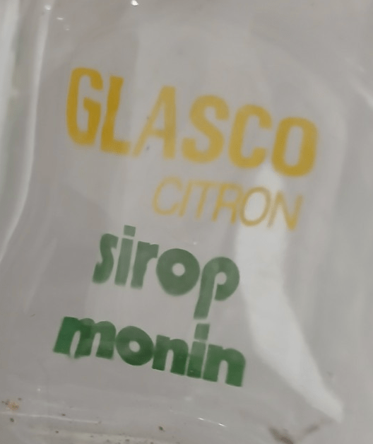 Carafe publicitaire « Glasco Citron / sirop Monin » (annonce eBay archivée).